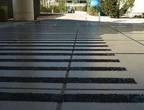 Slip reduction floor system applied to tiles at a shopping centre