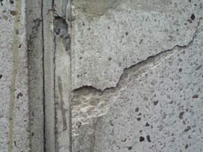 Cracked concrete chimney stack